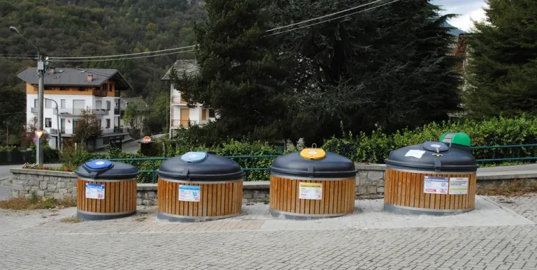 Semi-underground recycling island with polyethylene containers